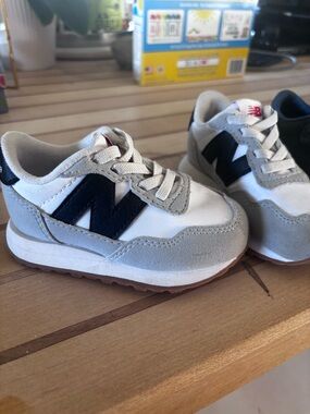 New Balance Kids Sneakers in White, Gray & Navy